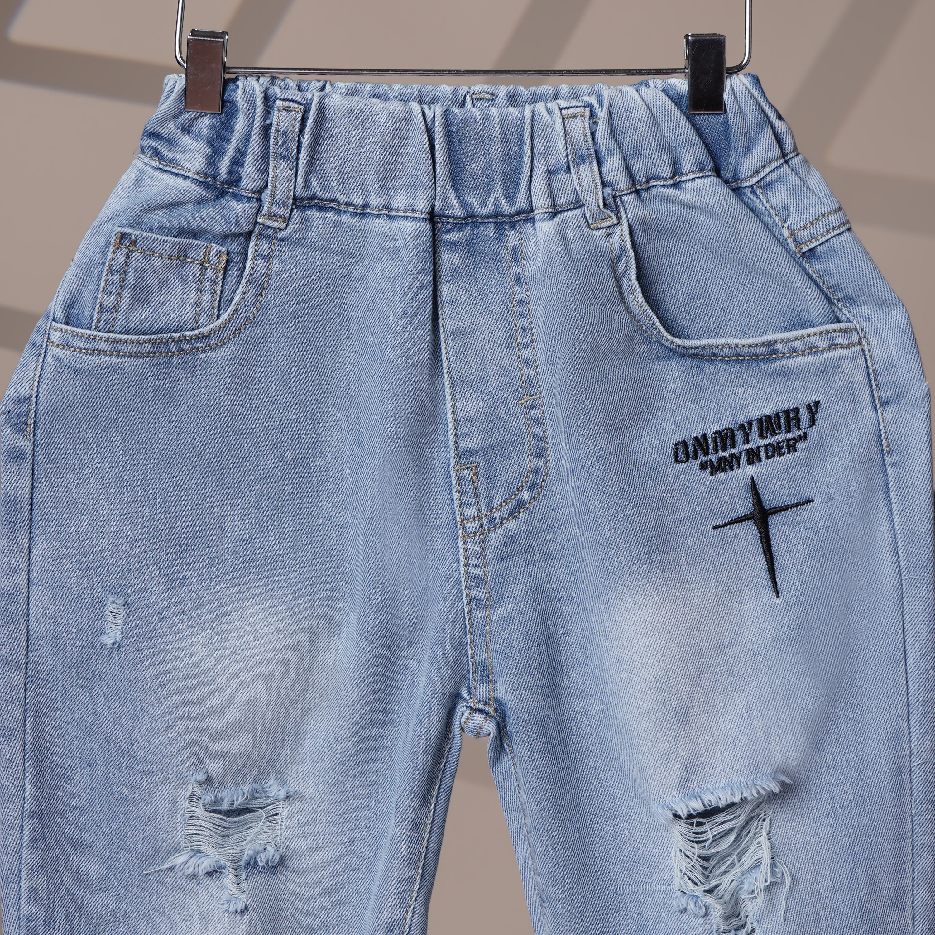 Mom N Genie Boy's Light Blue Distressed Denim Jeans with Printed Detail & Contrast Back Pocket