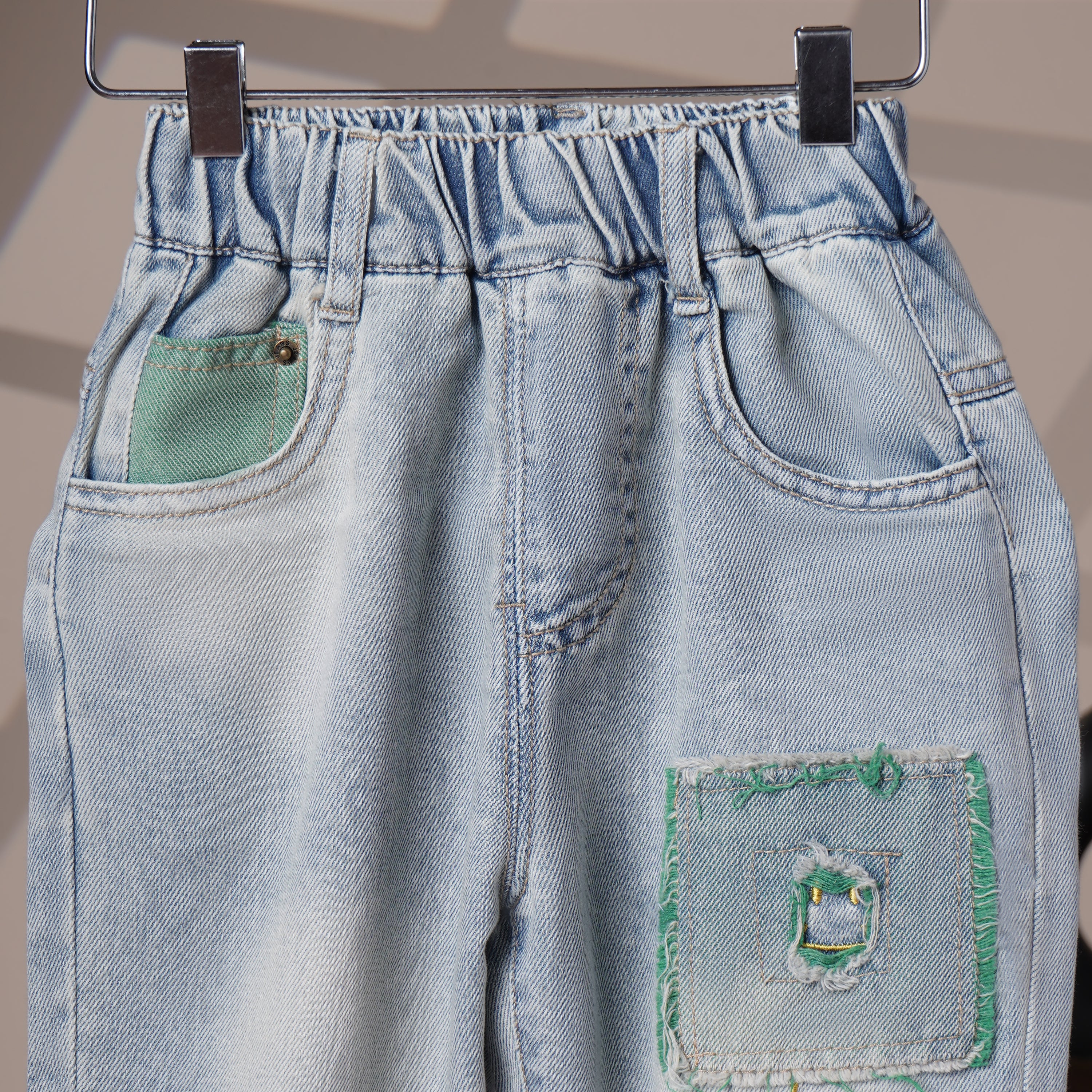 Mom N Genie Kids Light-Wash Denim Pants with Green Patch Detail — Elastic Waist, Casual Fit